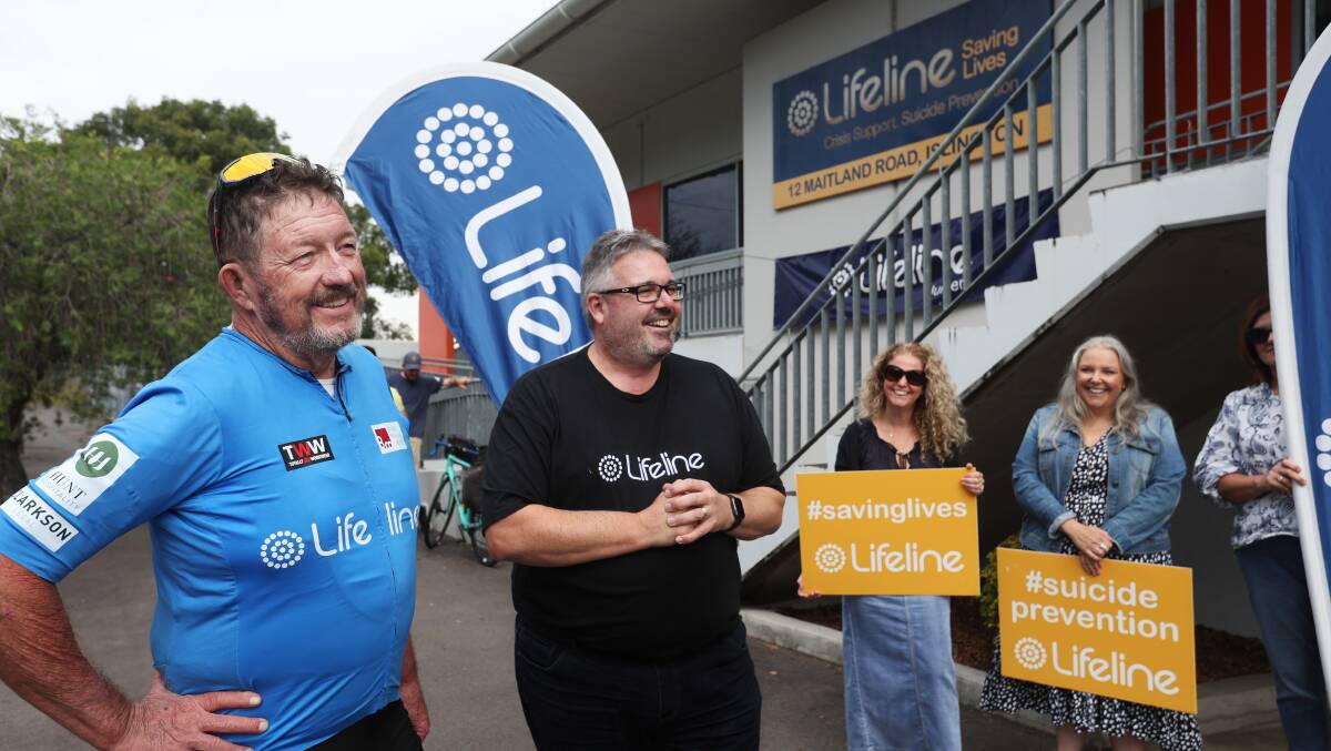 Lifeline CEO Robert Sams congratulates Ian Kidd on his 1800km bike ride to raise money for mental health services. Picture Simone De Peak