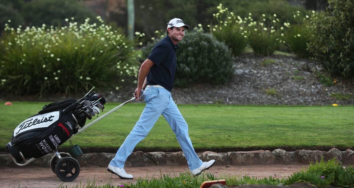 ON COURSE: Aaron Townsend walks to the next tee at the Lake Macquarie Pro-am last week. The former Charlestown pro hopes to play on the Japan tour in 2018. Picture: Simone De Peak.