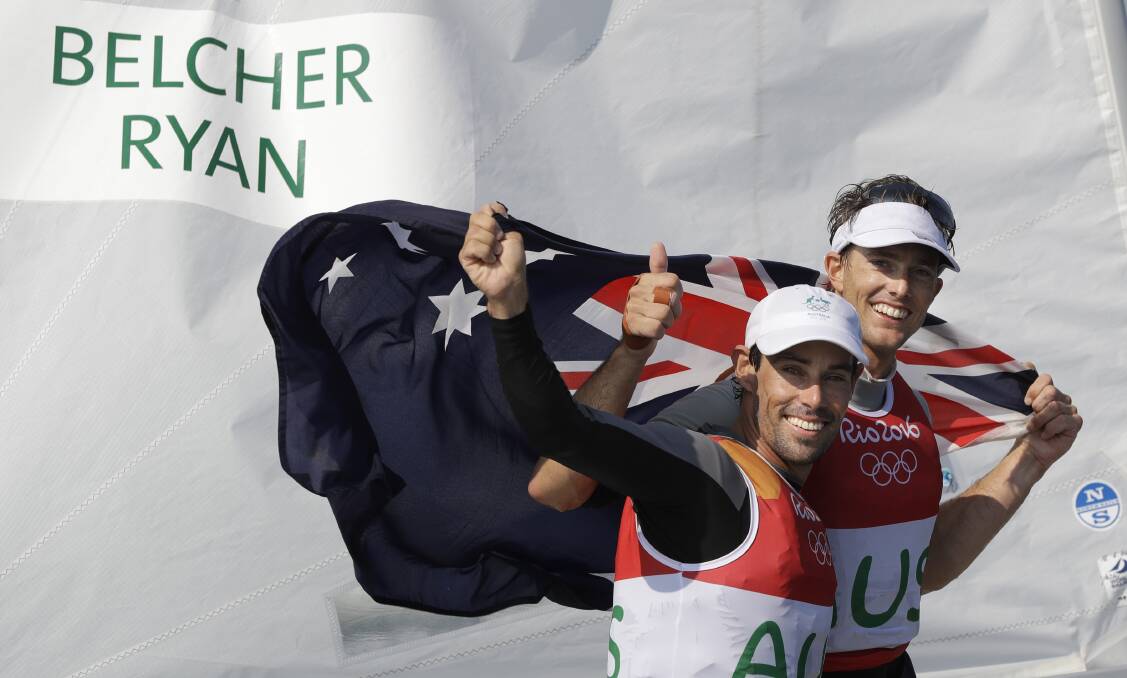 RIO: Mat Belcher and Will Ryan celebrate their silver at the 2016 Olympics. Ryan said their world championship victory was a boost as they considered their future on the water. Picture: AP Photo/Bernat Armangue