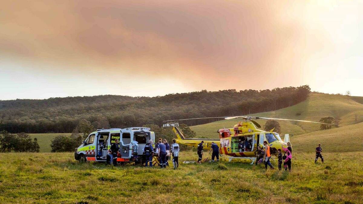 EERIE SCENE: The Westpac Rescue Helicopter made a significant detour around the Lone Pine fire to retrieve a 19-year-old man with a broken leg. Picture: Supplied 