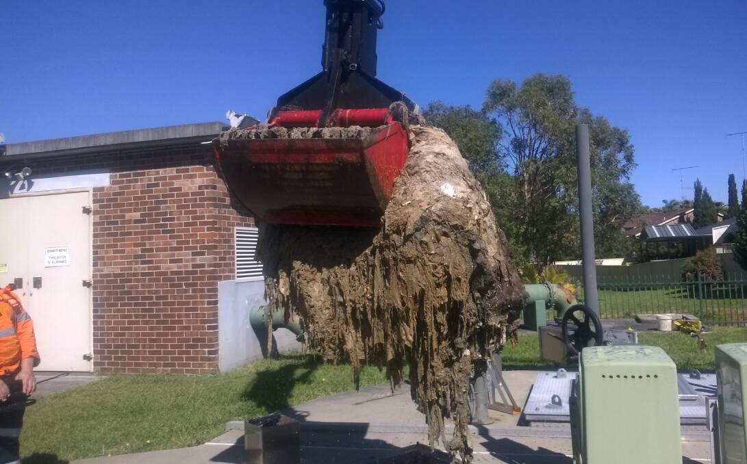 NOT FLUSHABLE: A sewage pumping station stops while a blockage of wet wipes, also known as a fatberg, is removed. Hunter Water is urging locals not to put wet wipes down the toilet. Picture: Fairfax Media