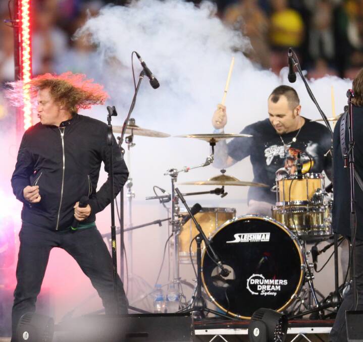 BIG GIG: The Screaming Jets, pictured at Hunter Stadium playing prior to the recent rugby league Test match, will perform at Belmont 16 Footers on Saturday night. Picture: Max Mason-Hubers