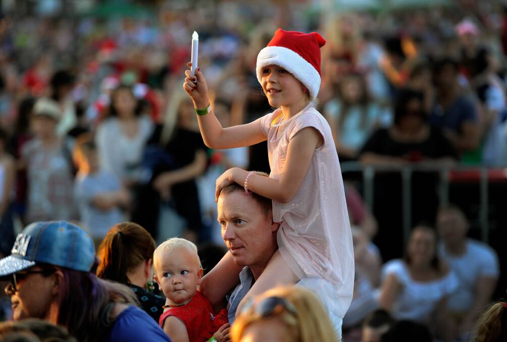 FAMILY TIME: The scene at last year's Lake Mac Carols. This year's event will be held at Speers Point Park on Sunday, December 9. Picture: Marina Neil