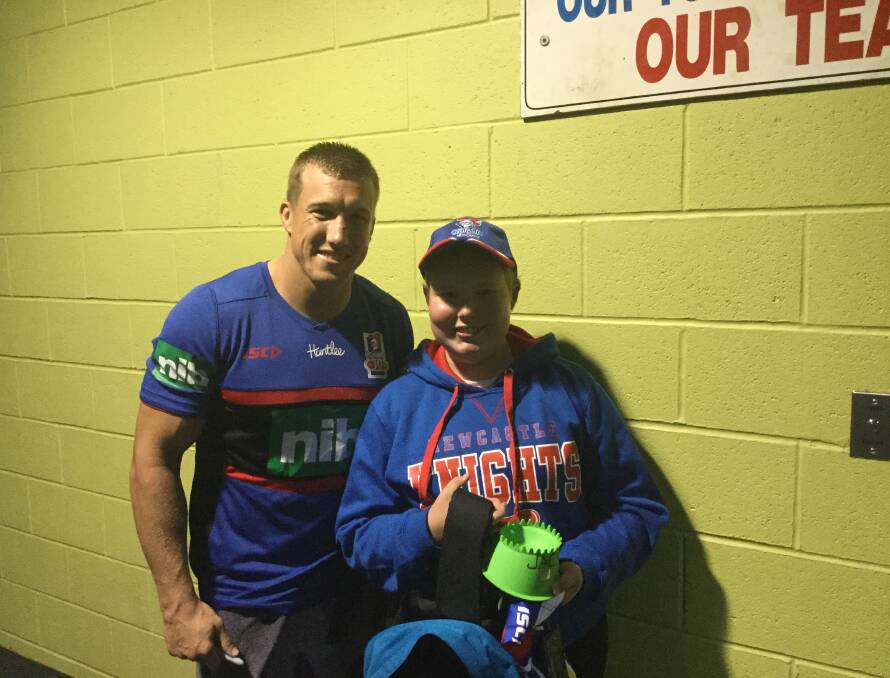 GENEROUS: Trent Hodkinson meets Morisset Park's Jacinta Gomez and presents her with some goodies, including his game day kicking tee. Picture: Supplied