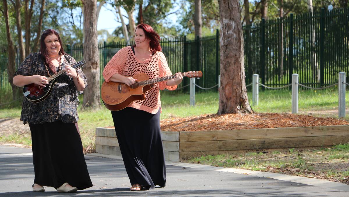 SISTER ACT: The Rough Diamonds, Cec van der Kamp, left, and Em Palmer, will host a community carols event in Morisset this Sunday from 5pm to 8pm. Picture: David Stewart