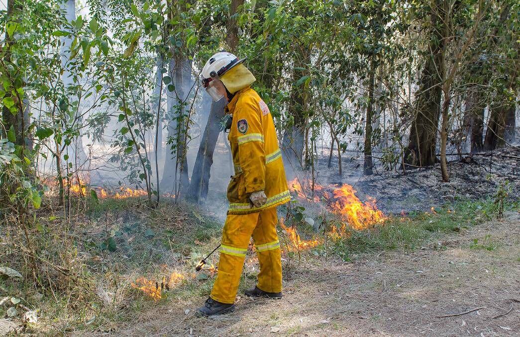 GETTING READY: Local Rural Fire Service personnel joined forces for a major hazard reduction burn at Eraring on Sunday. Picture: Chris VanderSchaaf
