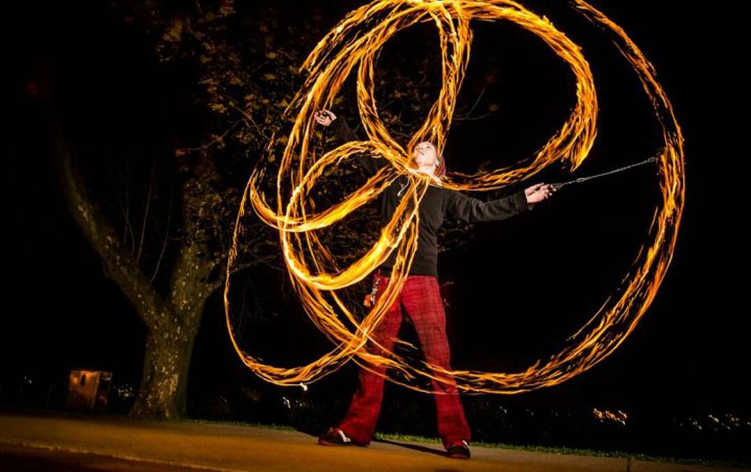 LIGHT SHOW: The Southlake Christmas Spectacular featured a mix of community and professional entertainment, including this fire twirler, in 2012. Picture: Supplied