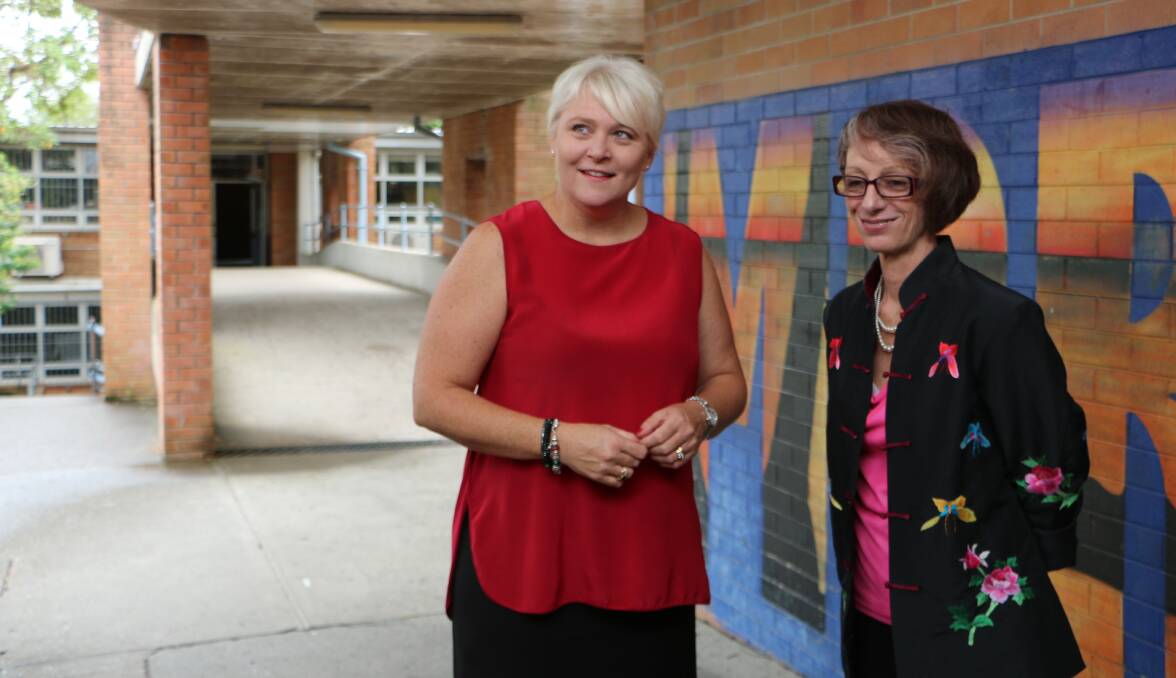 FIRST DAY: Principal Cheri McDonald, right, with director of public schools in the Lake Macquarie West network, Louise Gallagher, at Morisset High School where a raft of changes are in train. Picture: David Stewart