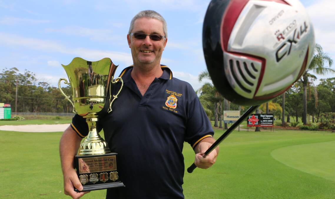 SILVERWARE: Des Green with the Morisset Memorial Cup that will be up for grabs at Morisset Golf Club on Friday. The four-person ambrose event is to raise money for a war memorial in the town. Picture: David Stewart