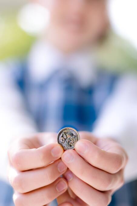 HIGH FIVE: Don't let your stray 5 cent coins go to waste around your house or in your car. Round them up and drop them into Heritage College, in Morisset, before next Friday, May 5.