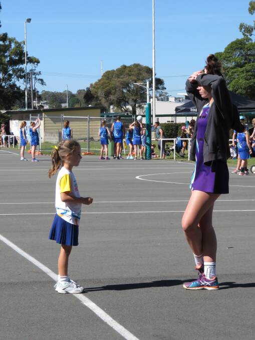 LEARNING: Facilitator Jayde Sullivan with a young participant in the Net Set Go session at Wangi Wangi on Saturday. Picture: Supplied