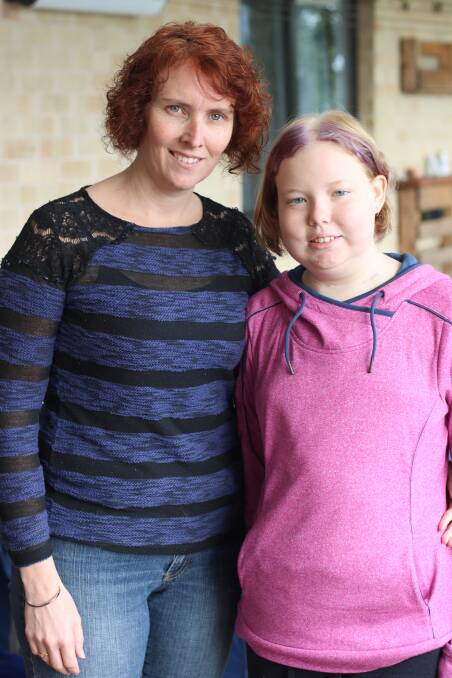 SUPPORT: Jacinta Gomez and mum Kirsten at their Morisset Park home in June, when the pair was amazed that more than $10,000 had been raised in the Cupcakes for Children with Cancer campaign. Picture: David Stewart