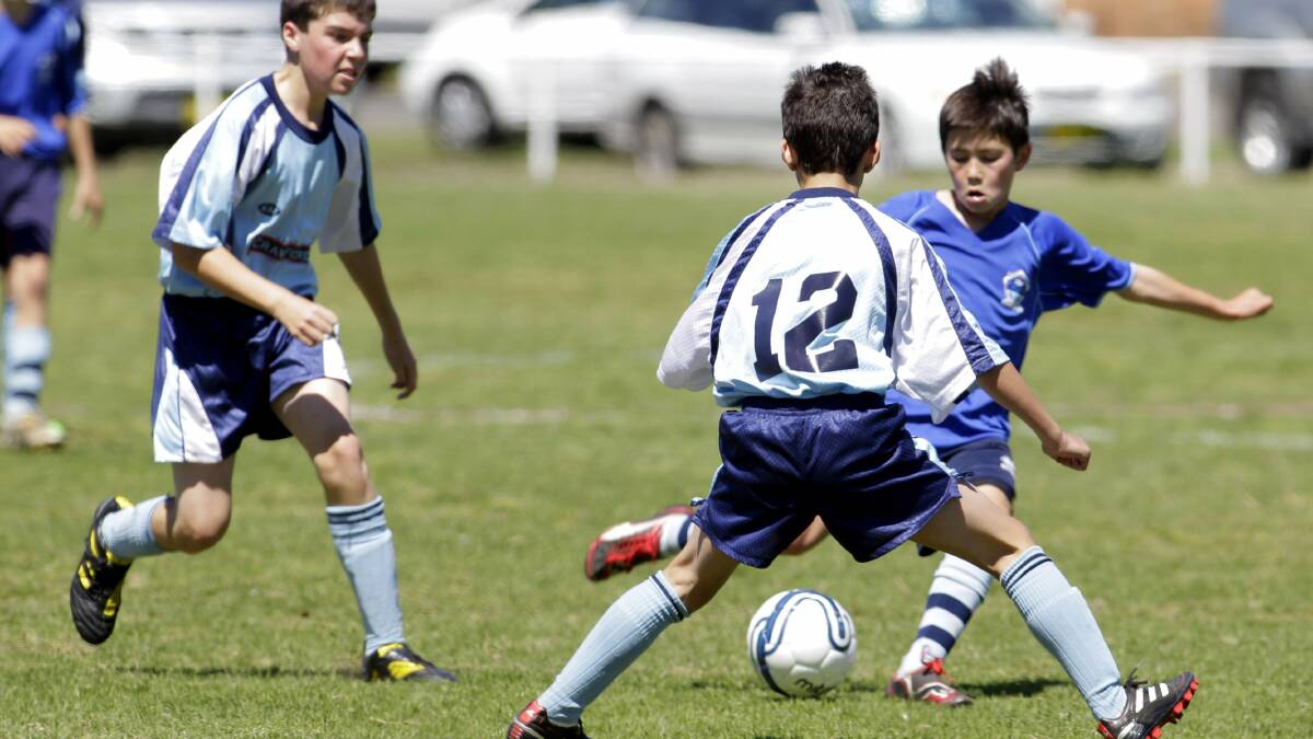 NUMBERS GAME: Junior soccer at Speers Point. Sport and health pursuits just got a lot more affordable for Lake Macquarie families. Picture: Peter Stoop