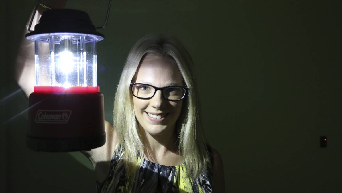 SWITCH OFF: Council's Sally Newport has her lantern ready for Earth Hour this Saturday at 8.30pm. Picture: David Stewart