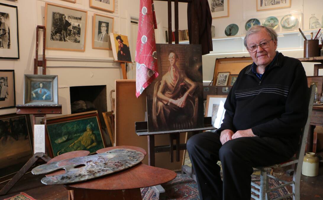 TREASURES: John Sheehan in Sir William Dobell's studio, at Dobell House. He's expecting a busy weekend as part of the Wangi Centenary Festival this Sunday. Picture: David Stewart