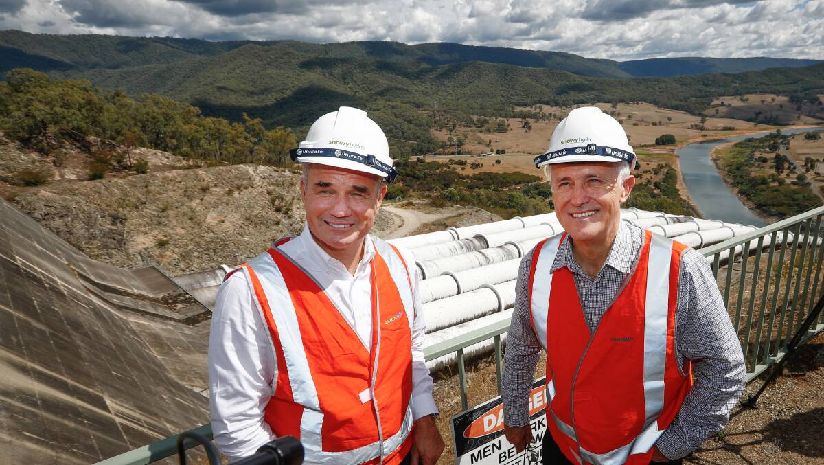 GENERATION: Prime Minister Malcolm Turnbull, right, with Snowy Hydro chief executive Paul Broad at the Tumut 3 power station on Thursday. Picture: Alex Ellinghausen