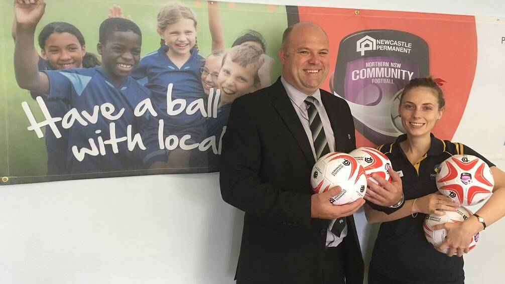 SUPPORTERS: Newcastle Permanent's mobile lending manager, Robert Whiting, with Newcastle Football operations assistant, Ainsleigh Bates. Picture: Supplied