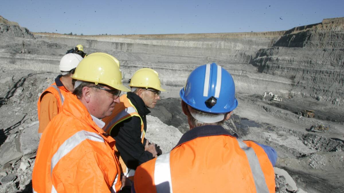 Big: The then Federal Opposition Leader Tony Abbott at Peabody's Wambo Coal mine in 2011. An independent scientific committee assessment of the company's underground expansion plan criticised water impact monitoring.