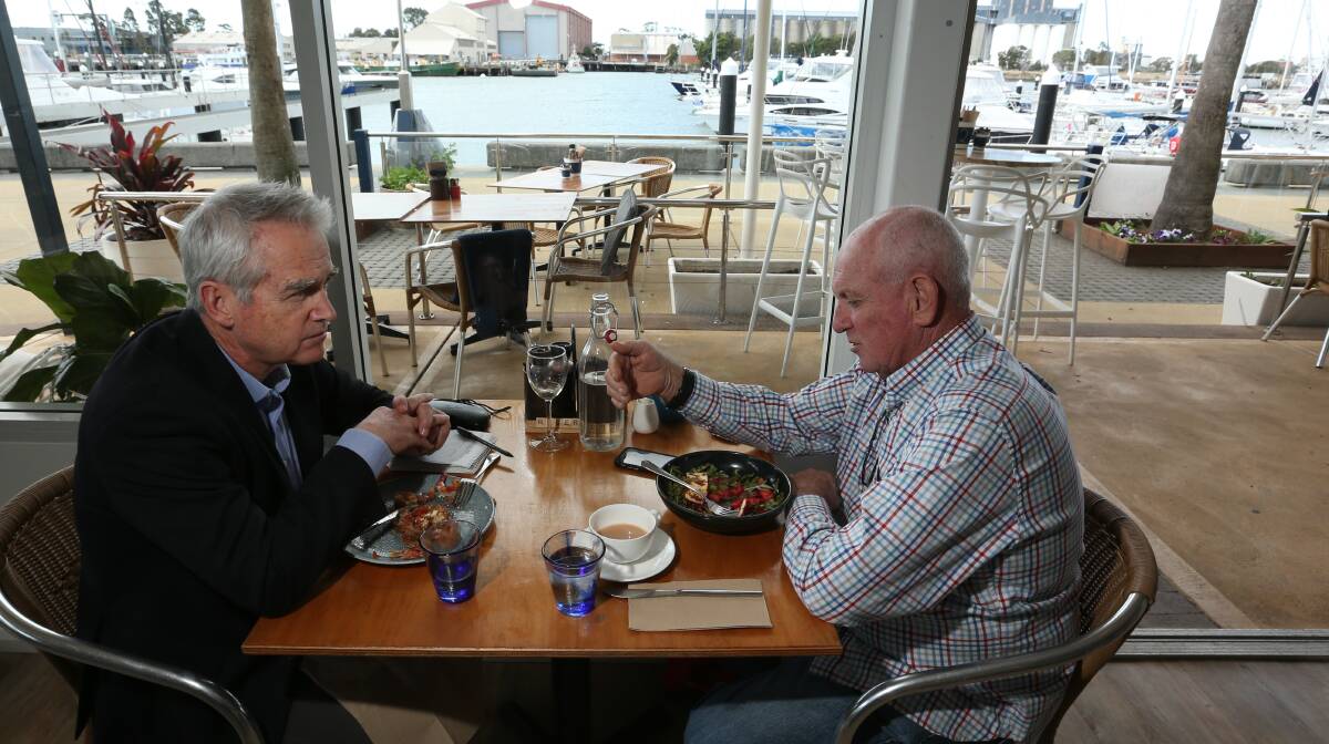 Sailor Tony Mowbray (right) and writer Scott Bevan at the Wickham Boathouse cafe. Picture: Simone De Peak