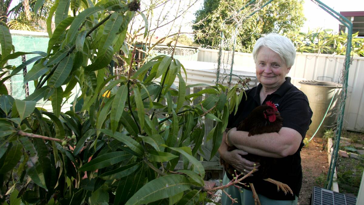 Sister Di holding one of her chickens in 2008