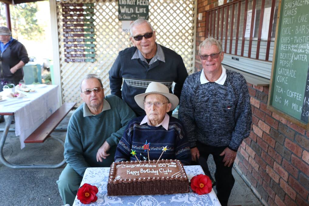 BIRTHDAY CAKE: Clyde Pearsall with his regular playing partners, from left, Bruce Cook, Don Brady and Jim Rea.