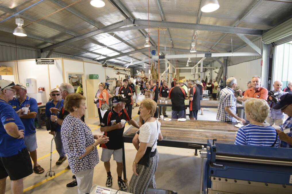 MEN'S BUSINESS: Members and guests enjoy morning tea after the official opening. Picture: Tony Rawlins