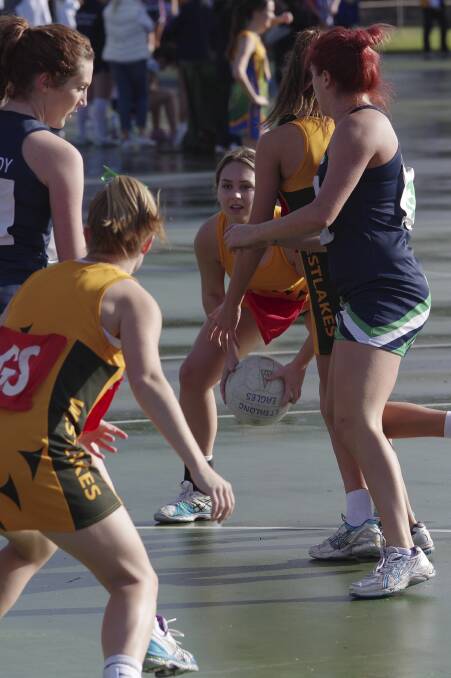 OPENING: Westlakes opens player Claudia Carver looks for a clean pass against Woy Woy at the Newcastle Carnival.