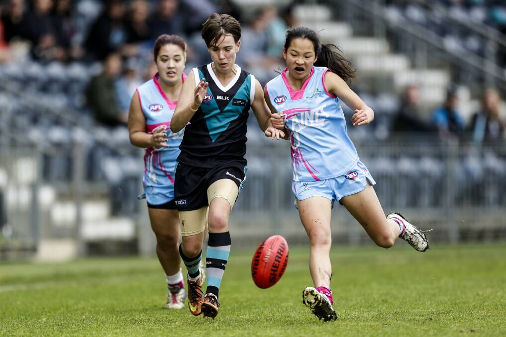 INTEREST: Action from the AFL Sydney women's grand final. By popular demand, plans are afoot to launch a local AFL competition for women. Picture: Anna Warr