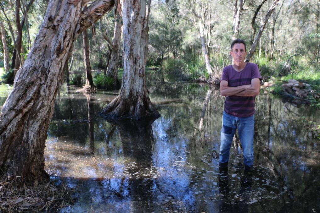 WARNING: Resident Mark Mannile at Dora Creek, where testing has revealed local mosquitoes are carrying Barmah Forest virus. Picture: Jamieson Murphy
