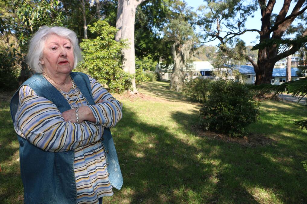 COMMUNITY'S LAND: Judy McQueeney has lived next to the reserve for 65 years and believes it's a much loved piece of land. Picture: Jamieson Murphy