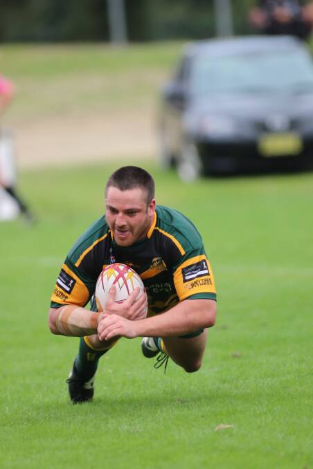 MEAT PIE: Scorpions prop Adam Swadling goes over for a try. Picture: David Stewart