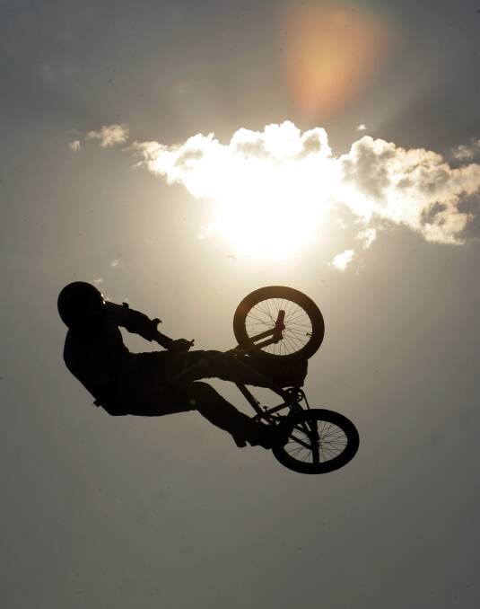 HANG TIME: See professional freestyle BMX riders in action at Morisset. Picture: Reed Saxon