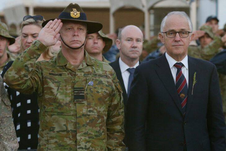 Prime Minister Malcolm Turnbull attended an ANZAC Day ceremony at Camp Baird in the Middle East with Chief of the Defence Force Air Marshall Mark Binskin after visiting troops in Iraq and Afghanistan on Tuesday 25 April 2017. Pool Photo: Andrew Meares  Photo: Andrew Meares