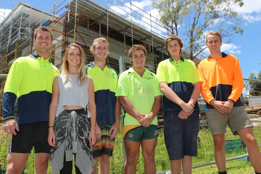 YOUTH FORCE: Among the young locals employed as a direct result of the Wyong Street apartments are Jay Richley, Sky Richley, Jackson McLachlan, Khai Nilsson, Craig Harmon and Matt Sharp. Picture: Jamieson Murphy