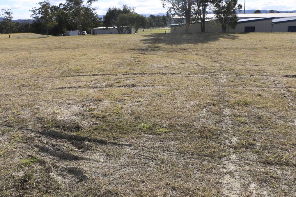 VANDALISED: Tyre marks scar the surface of Les Norris Oval at Morisset. Picture: Jamieson Murphy