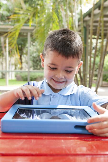 ENGAGING: Zachary Hanger learns on an iPad.