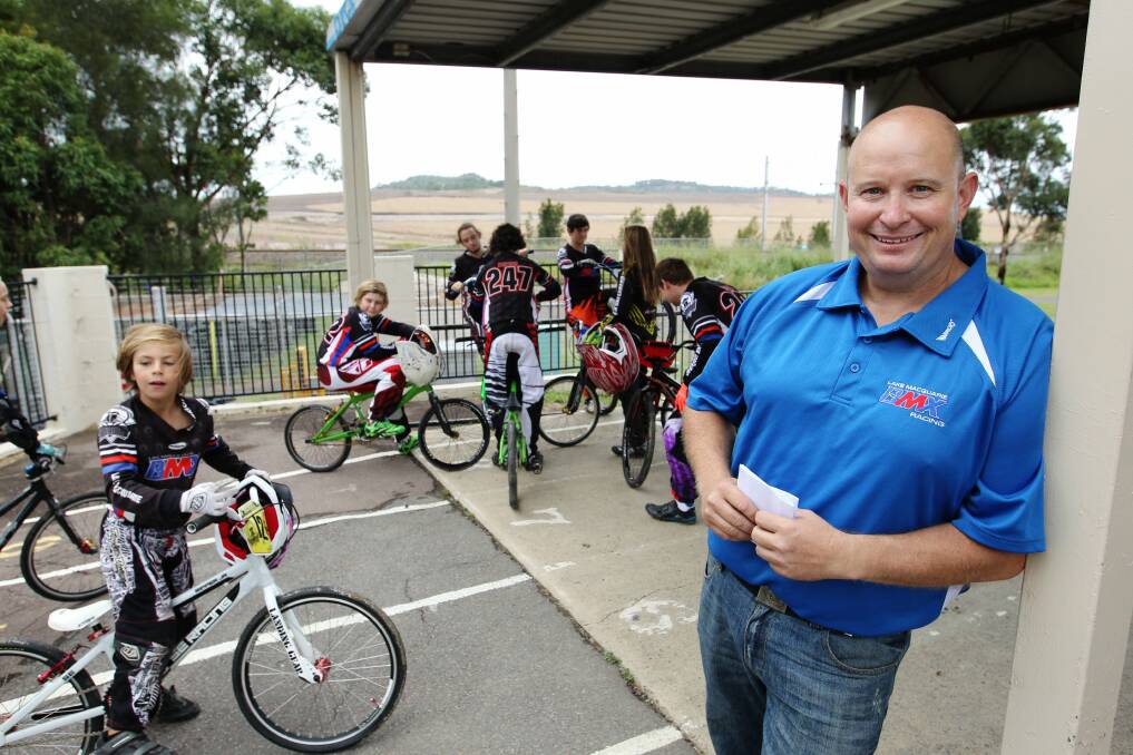 ON A ROLL: Michael Mavin with riders at the Lake Macquarie BMX facility at Argenton on Friday. Picture: Max Mason-Hubers