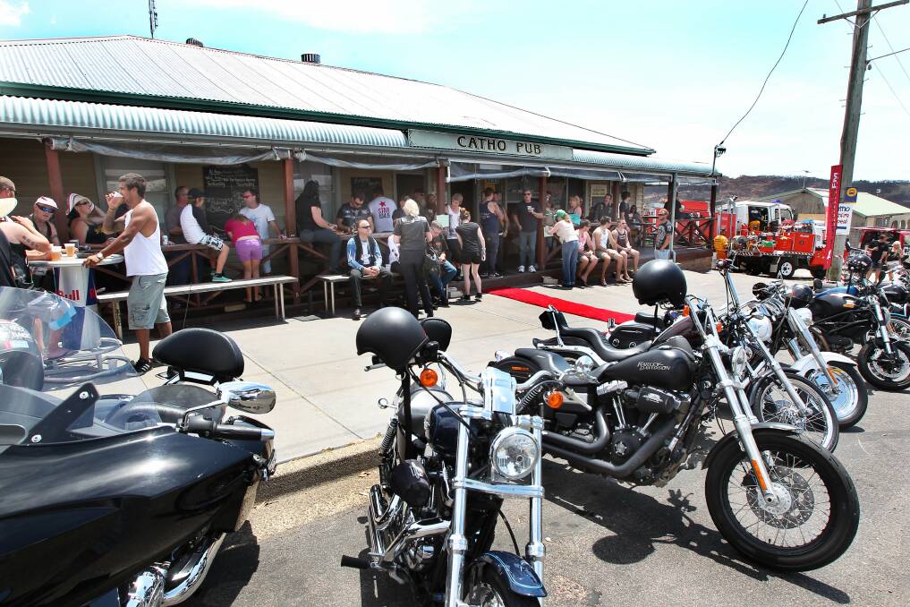 SAVOURED: Patrons packed the Catho Bay Pub after the October blaze to thank local firefighters for saving the historic watering hole. Picture: Phil Hearne
