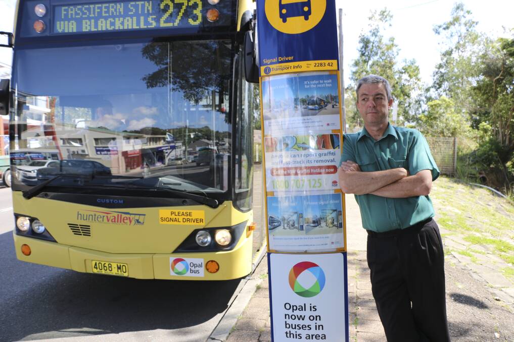 OVER IT: Peter Barry, pictured at the Toronto station bus stop, said it's not worth using his Opal card for the 273 bus route. Picture: Jamieson Murphy