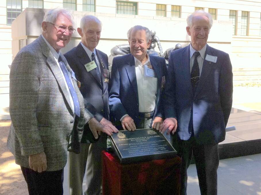 MATES: This picture from 2010 in Canberra at a commemoration of the 2/10 Field Ambulance unit shows, from left,  Ken Collins, Mick Kildey, Reg Jarman, and Dr Peter Hendry.
