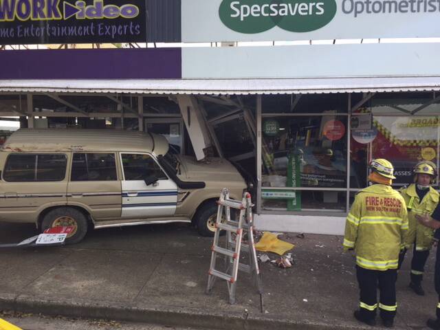 LUCKY: The four-wheel drive was unoccupied when it rolled into the shopfront.