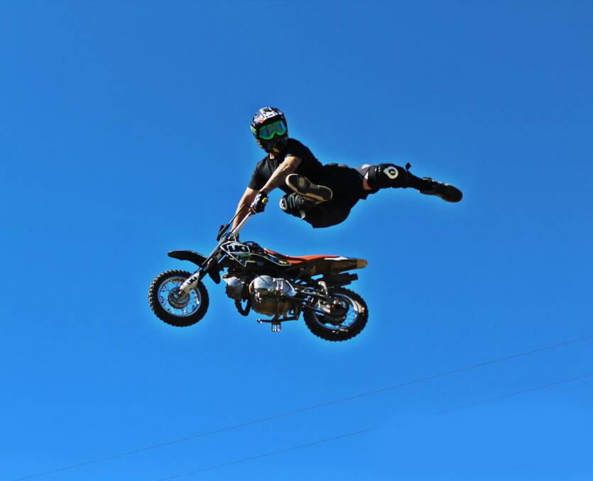 DEATH DEFYING: Catch the professional daredevils performing amazing tricks on their mini motorbikes at Morisset Show on Saturday, January 31.