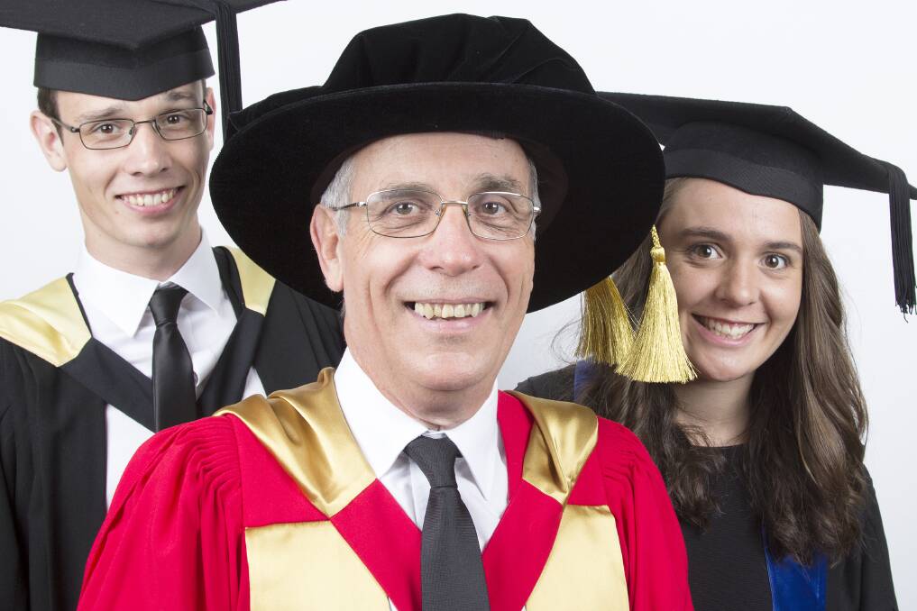 IN THE FAMILY: Caleb and Rachel Rankin will graduate with their father, Paul, the first student to begin and end his PhD at Avondale. Picture: Brenton Stacey