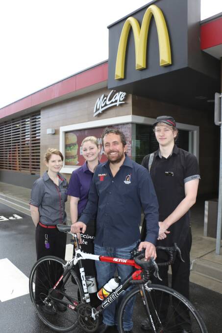 GOOD CAUSE: Morisset McDonald's crew members Jacqui Conway, Renae Burton and Lachlan Chappell with Adam Sherman on Tuesday. Picture: Jamieson Murphy