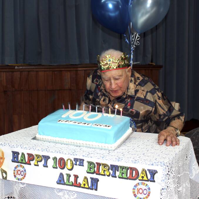 TRIPLE FIGURES: Allan Pryor blew out his birthday candles surrounded by friends and family.