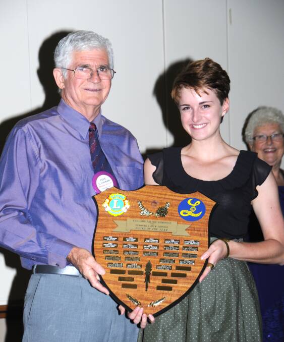 WINNING DESIGN: Emily Charlton with Toronto Lions Club president Lyle Constable.