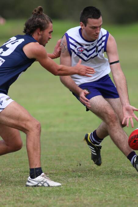 MIDDLE MAN: Co-captain James Rigby, right, was one of the Dockers' best on Saturday. Picture: David Stewart