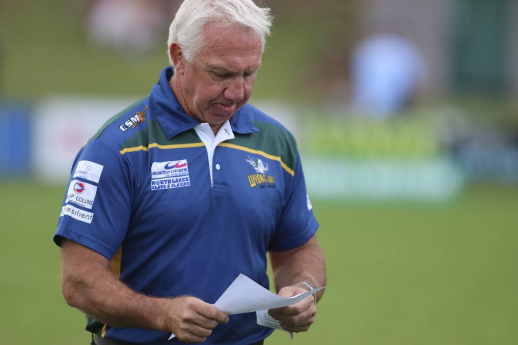 HONOUR: Wyong coach Rip Taylor on his way to a half-time address at Morry Breen Field. Picture: David Stewart