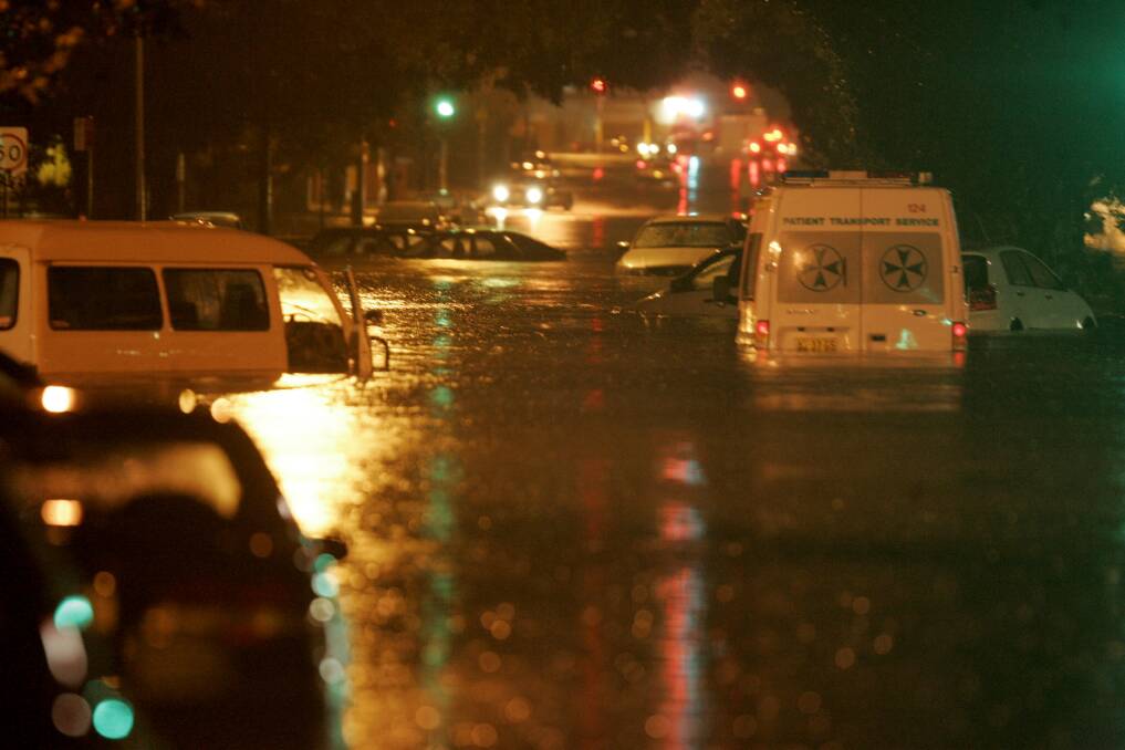 ORDEAL: Floodwaters trapped many motorists inside their vehicles during the storm in 2007. Picture: Peter Stoop