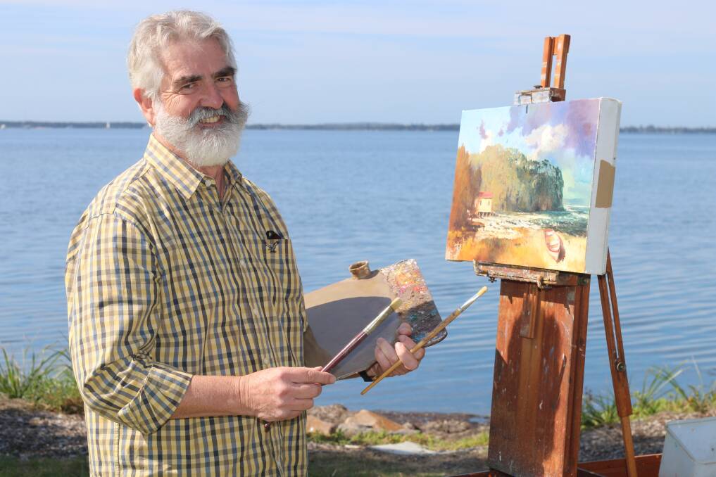 LOCAL INSPIRATION: Artist Graham Cox at work on the shores of Rathmines this week. Picture: Jamieson Murphy